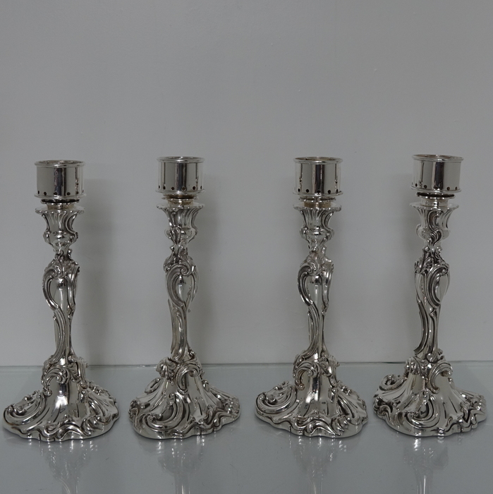 set of four candlesticks