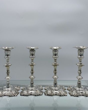 set of four candlesticks